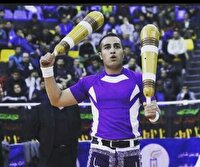 دو نشان طلای جام جهانی ورزش‌های زورخانه‌ای بر گردن باستانی کار فارسی